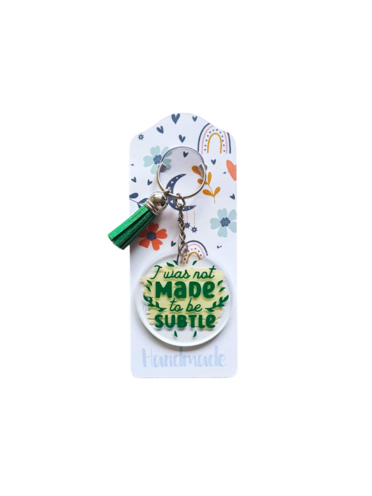 Breloc acrilic "Was Not Made To Be Subtle"