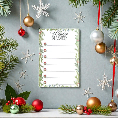 planner magnetic de iarna cu rama verde din brad si decoratiuni, pe fundal tematic de Craciun
