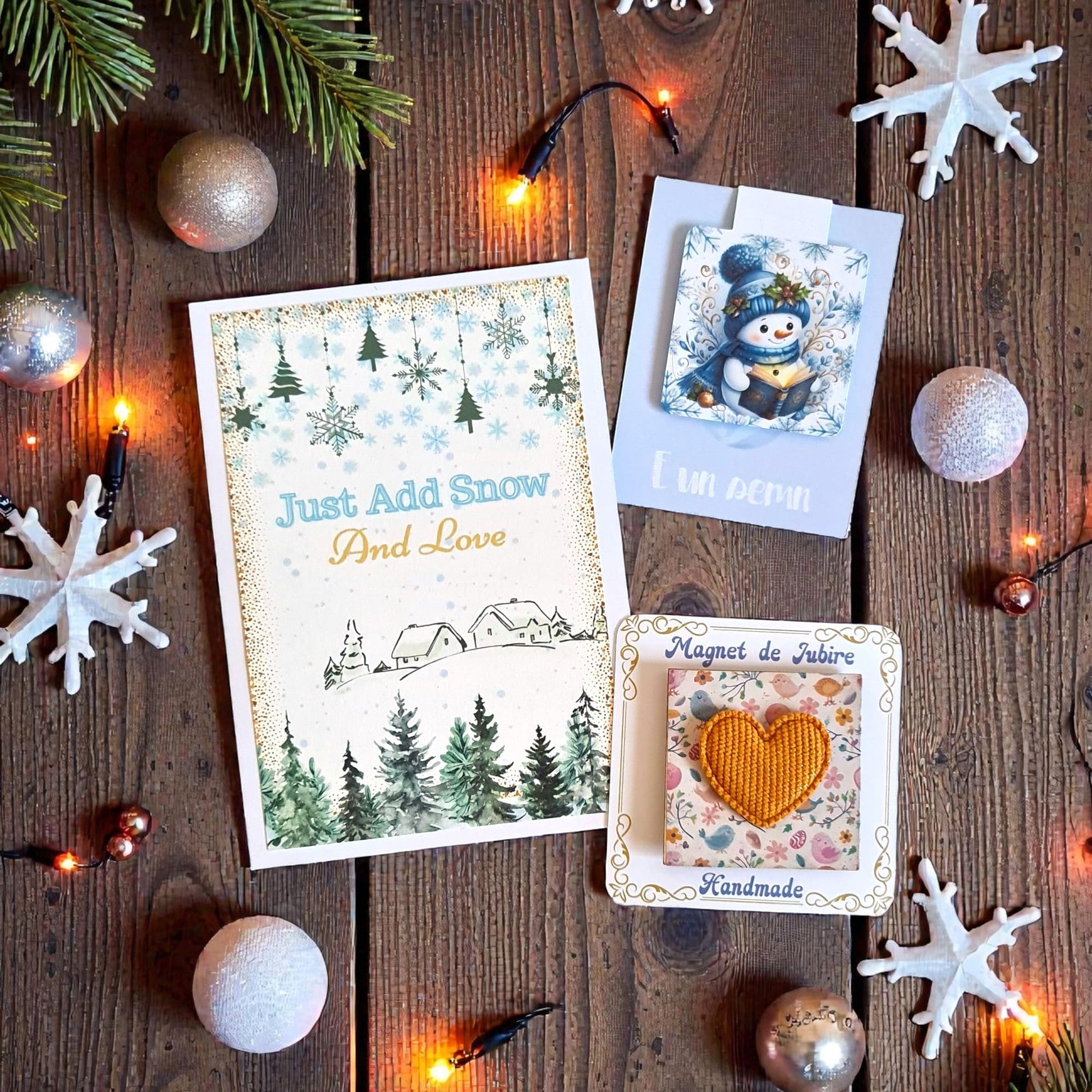 Set cadou oentru sarbatorile de iarna cu felicitare handmade cu ilustratie si mesaj, semn de carte magnetic cu om de zapada care citeste si magnet handmade personalizat cu inima 3d